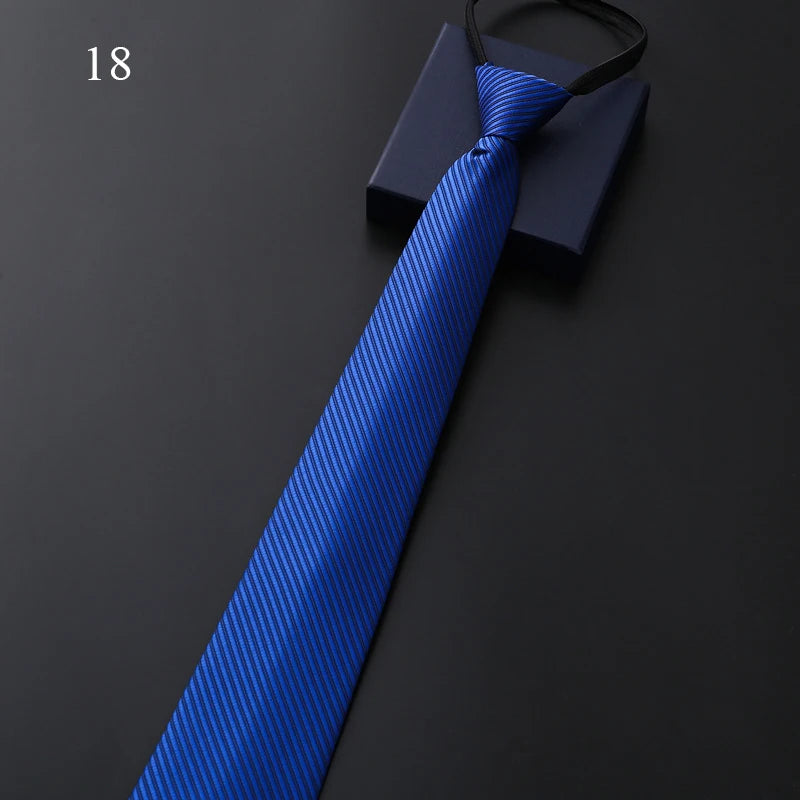 Blue striped tie on a dark background