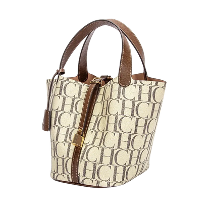 Beige handbag with brown handles and zipper