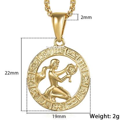 Gold pendant with measurements on a white background