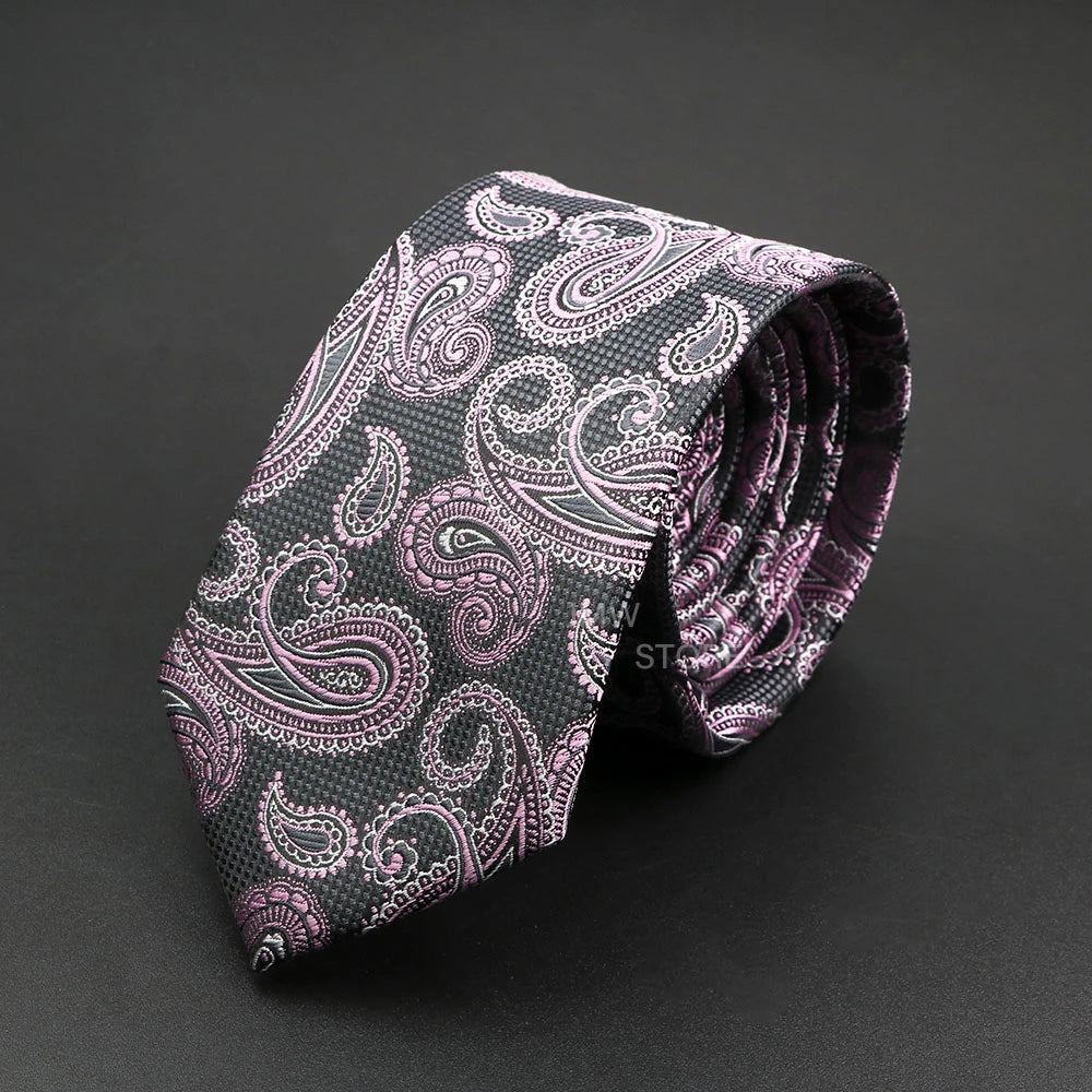 Paisley patterned tie on a dark background