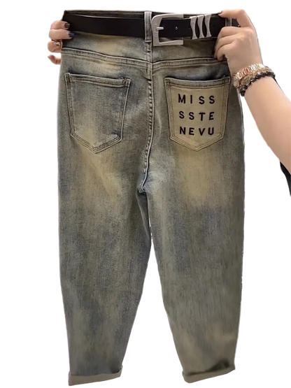 Denim jeans with 'MISS SSTE NEVU' branding