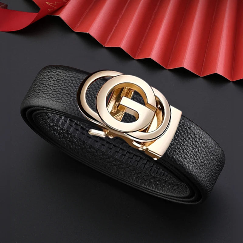 Black leather belt with gold buckle on a dark background