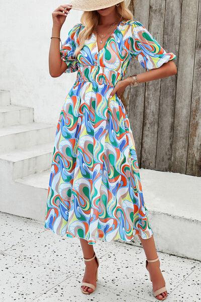 Smocked Printed V-Neck Short Sleeve Dress Carauana Store