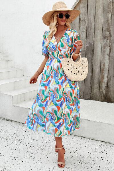 Smocked Printed V-Neck Short Sleeve Dress Carauana Store
