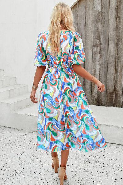 Smocked Printed V-Neck Short Sleeve Dress Carauana Store